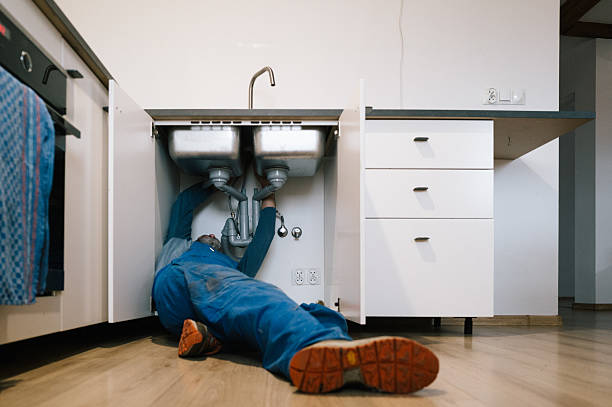Professional Emergency Plumber technician working in Gulf Breeze, FL